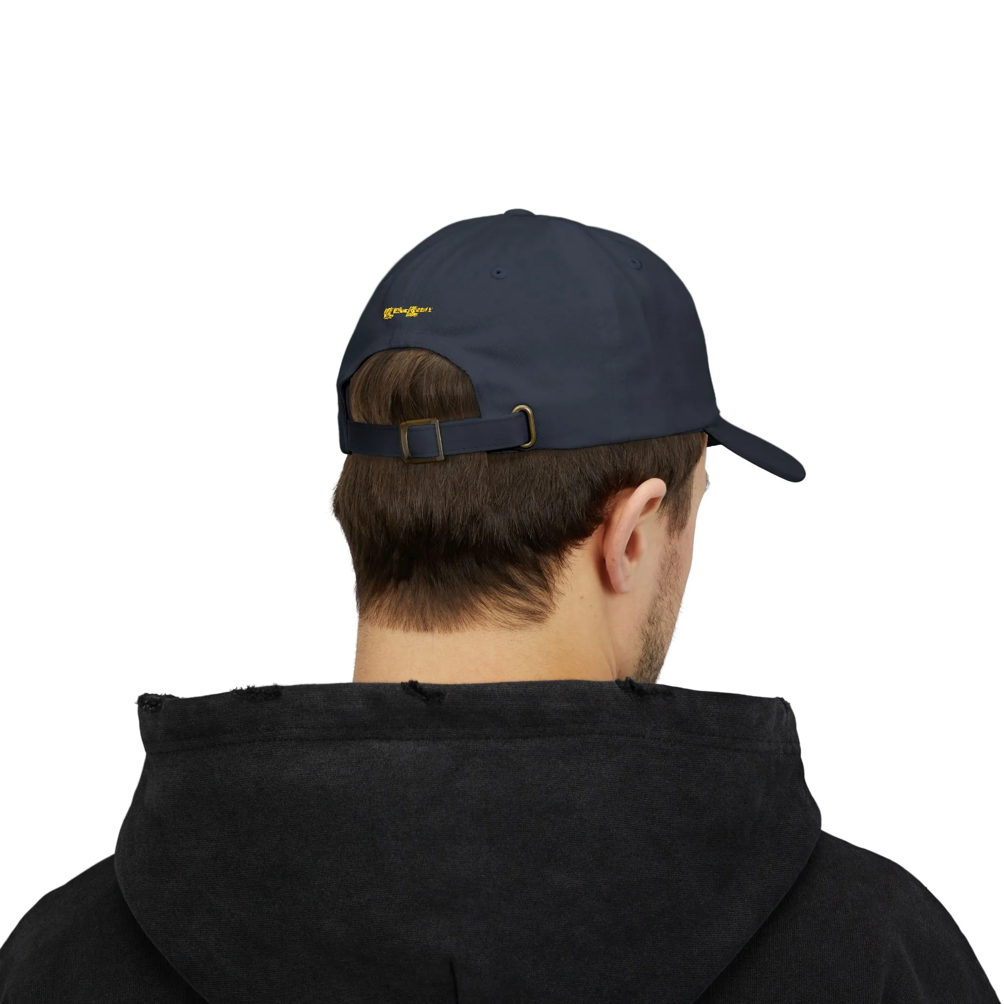 Navy baseball cap embroidered with a yellow question mark, shown in product and modeled views.