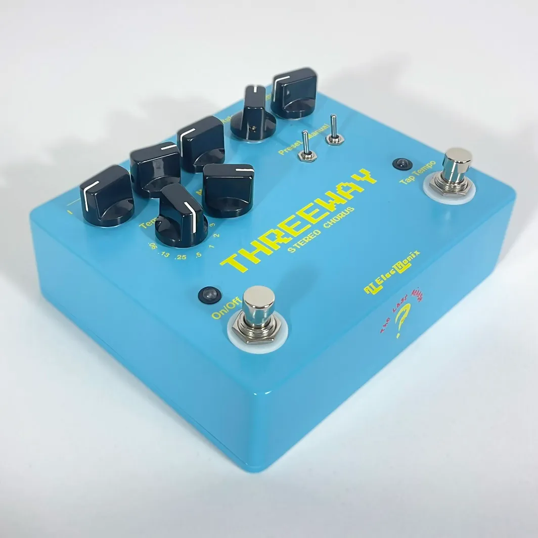 Front view of a light blue The Last Ménage Threeway stereo chorus pedal.